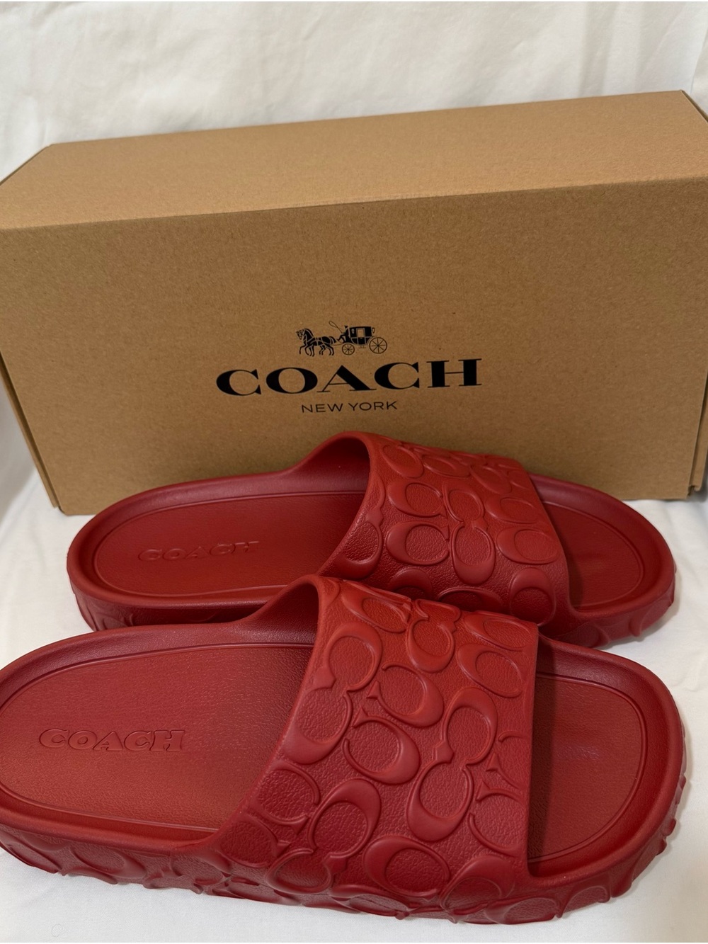 Brand new! Men’s size 11. Coach Bay Slides Sandals in red/poppy